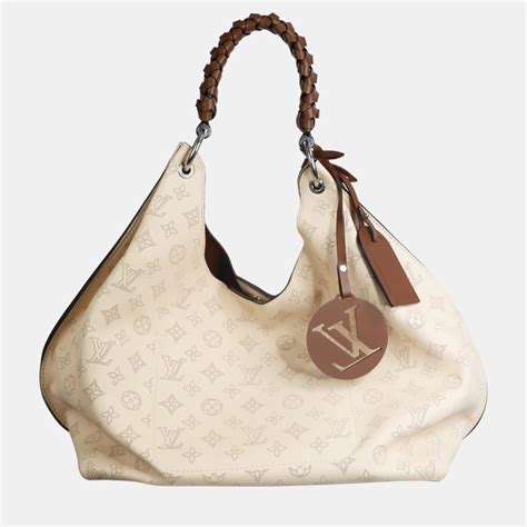 louis vuitton black and cream bag|louis vuitton mahina hobo bag.